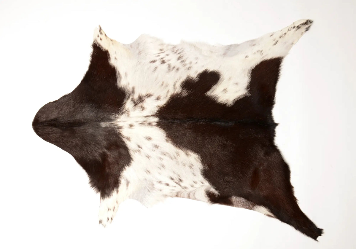 043 Goat Skin Rugs | Dark Brown & White Rug — Gorgeous Creatures