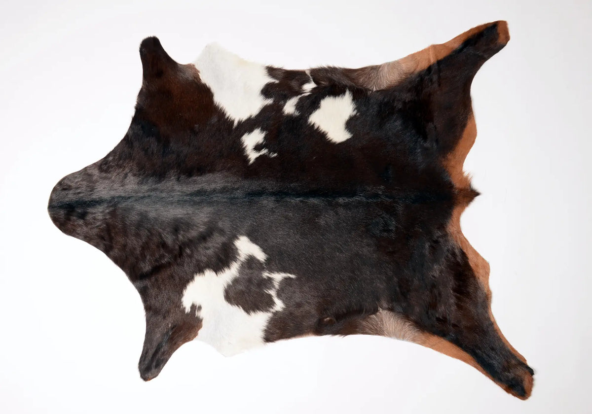 047 Goat Skin Rugs | Dark Brown & White Rug — Gorgeous Creatures