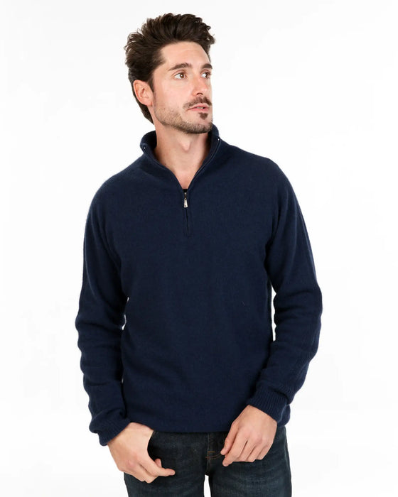 Man wearing a navy possum and merino wool blue pullover