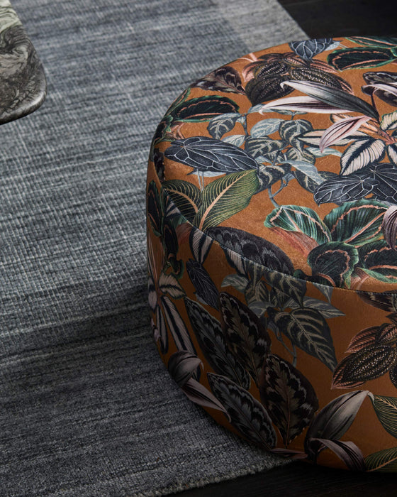 Round drum ottoman in Zanzibar velvet jungle fabric