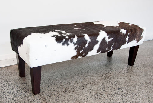 Long bench ottoman in cowhide