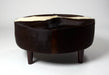 NZ cowhide ottoman round cream and chocolate