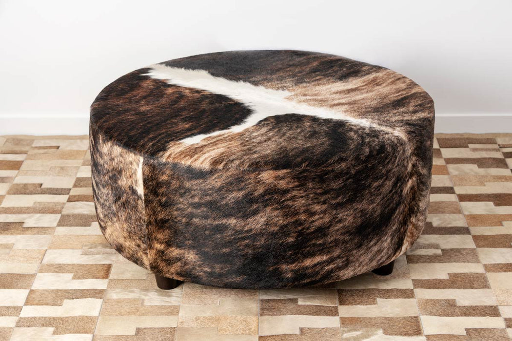 Deep round cowhide ottoman Gorgeous Creatures