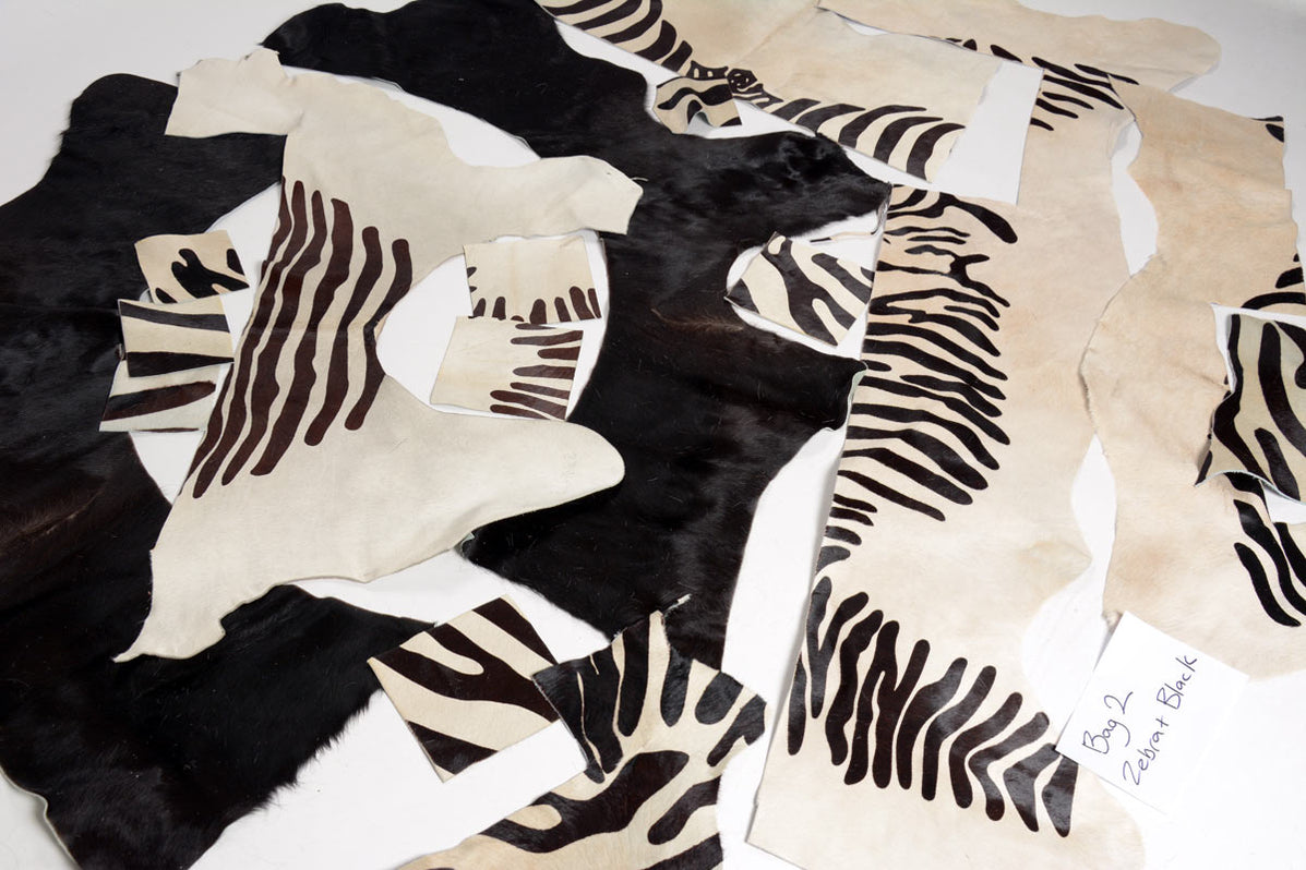 Bag 2 cowhide offcuts zebra black — Creatures