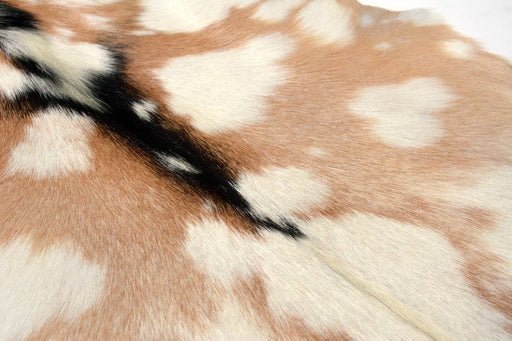 Goatskin rug tan and white