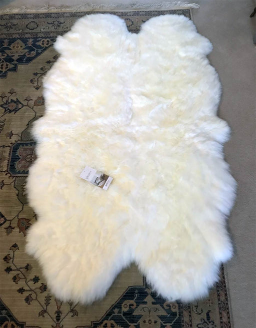 Ivory wool sheepskin rug - Quarto (4-skin) 110cm x 180cm