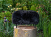 NZ black sheepskin footstool