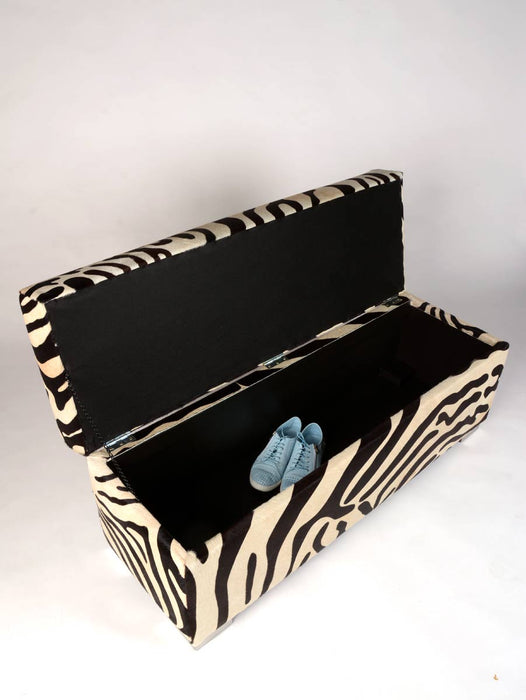 Storage ottoman inside in zebra print 120x40x45cm