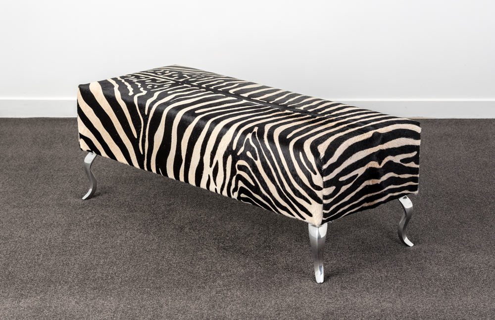 Zebra cowhide ottoman with metal legs Gorgeous Creatures