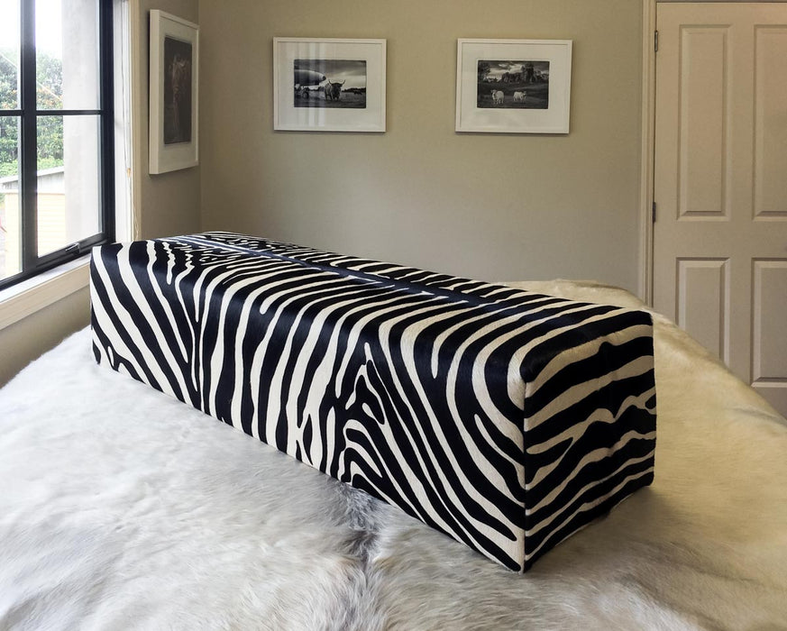 Large bench ottoman covered in zebra print