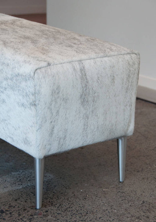 Grey cowhide ottoman long bench style