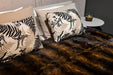 Natural Reddish Brown Possum Fur Throw on a bed