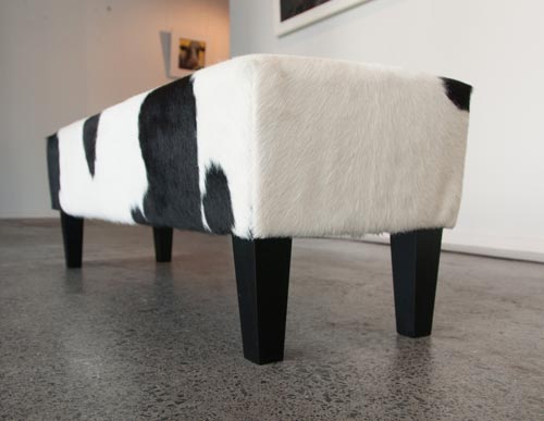 Black & white cowhide bench seat ottoman